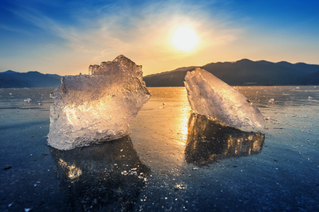 Very large and beautiful chunk of Ice at Sunrise in winter.